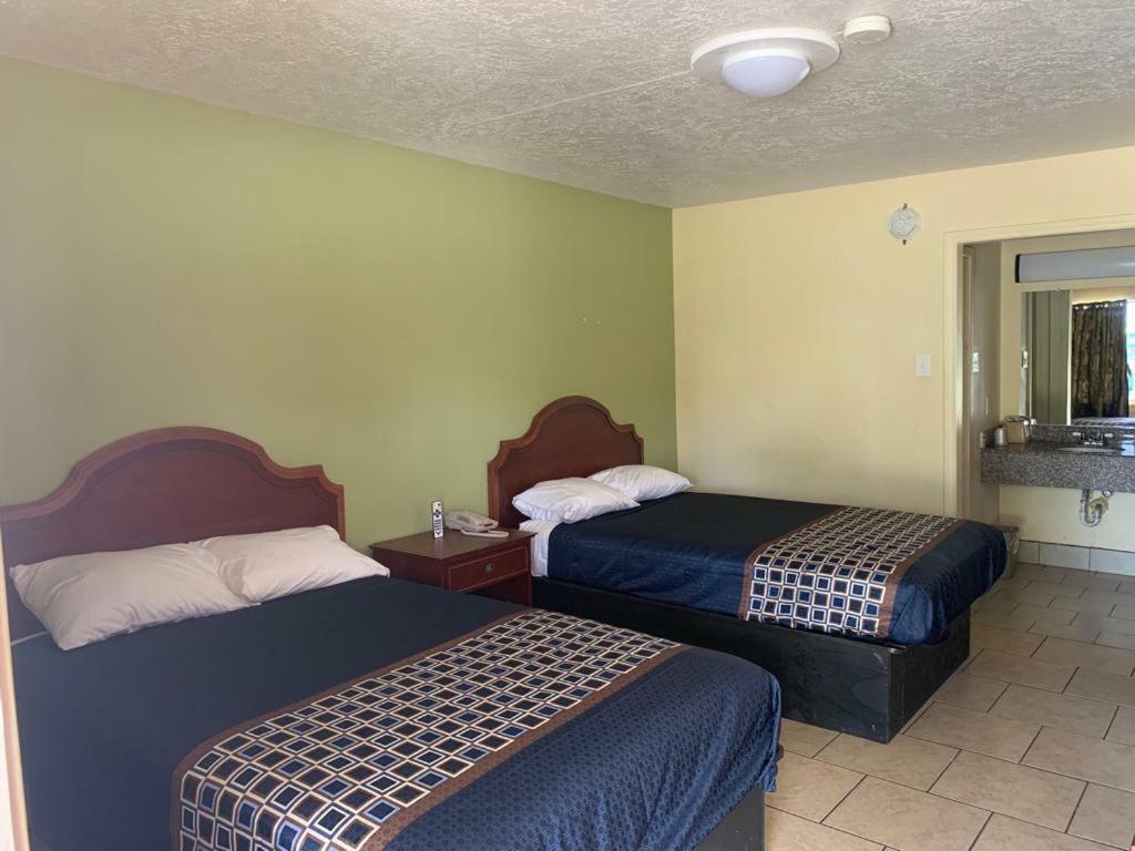 Texas Inn Beaumont Esterno foto